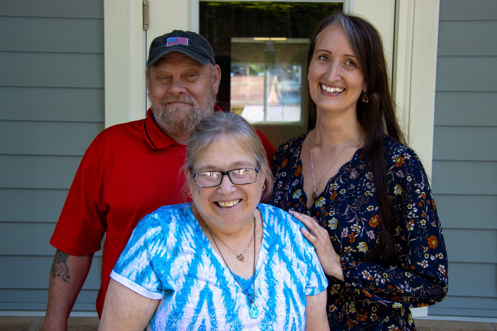 Residents Kevin and Charlie Nickleson with Kittie Tuinstra.