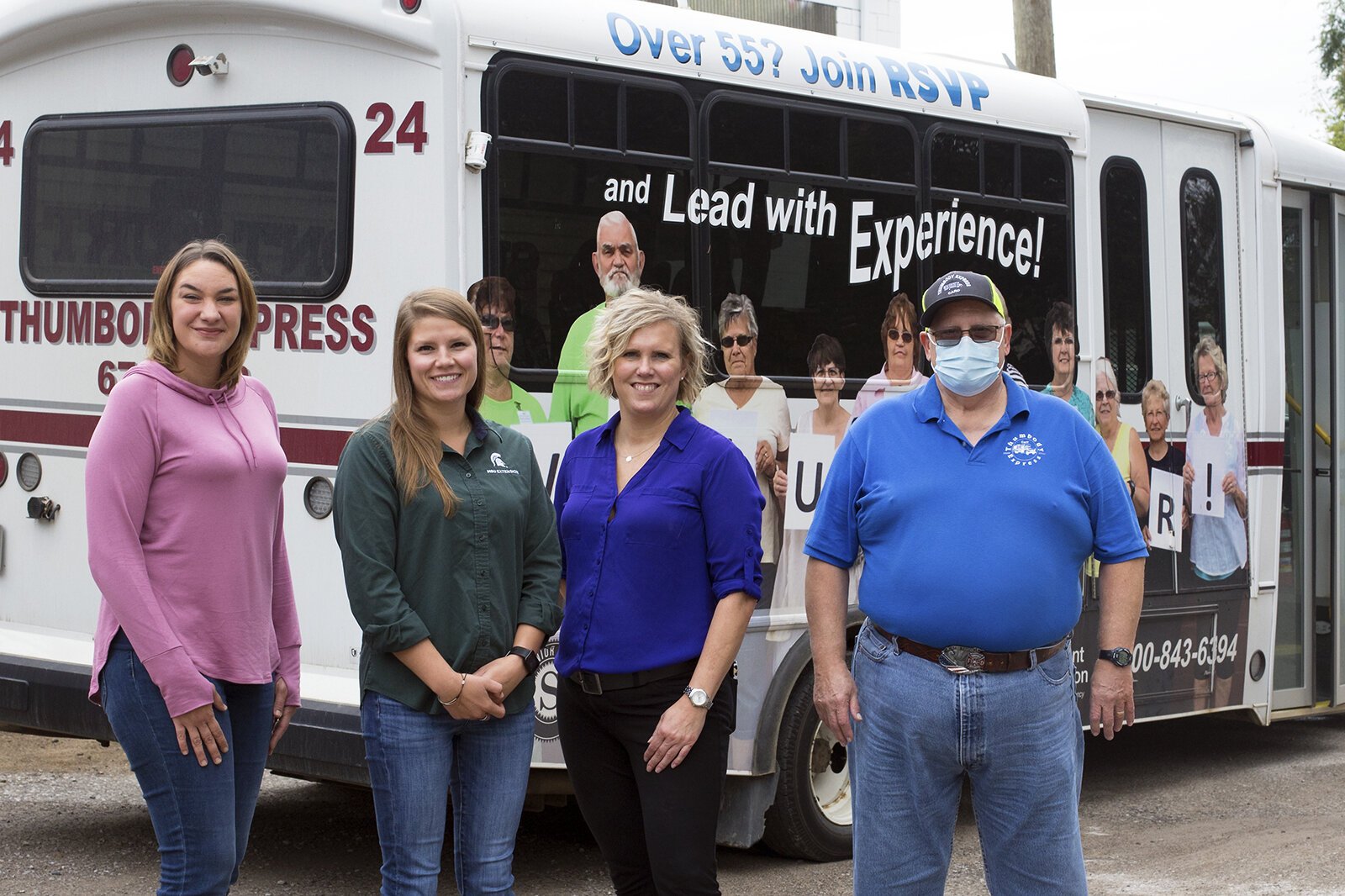 Lauren Amellal, Karly Creguer, Tracy Robinson, and Human Development Commission Bus Coordinator Larry Boitel.
