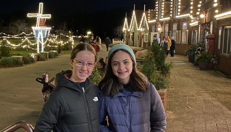 Ava Devanney with her exchange student, Montse Muralles at Windmill Island in Holland.