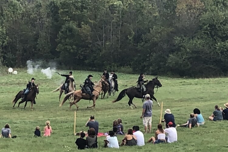 Spectators watch the 2019 Civil War Muster at Van Raalte Farm. (Mary Bale)