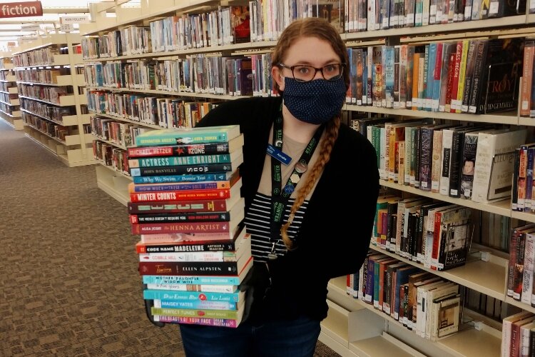 Librarian Annaka Koster will be among HDL staff who will curate take-and-make boxes for March is Reading Month.