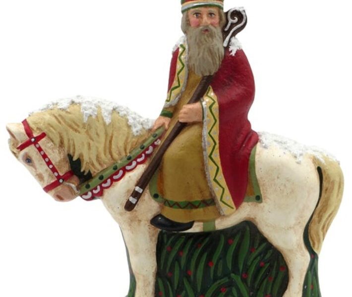 St. Nicholas, known as Sinterklaas, rides a horse in the Netherlands. Papier mache figure made by Susan Brack, Liberty, Indiana, from a German Anton Reiche chocolate mold dated around 1930.