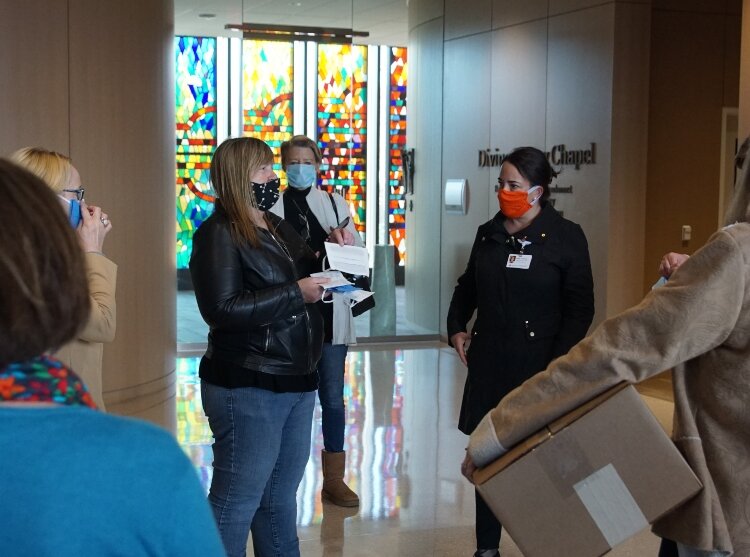 Herman Miller's Penny Garlock drops off donations at Mercy Health.