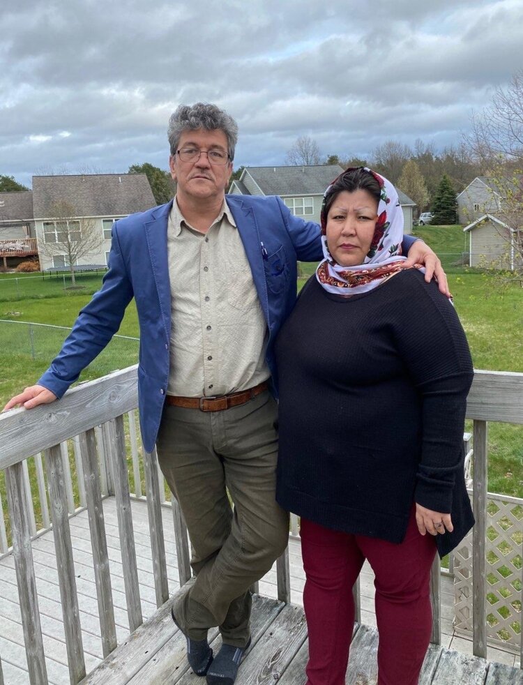 Ebrahim Mohammad Eshaq with his wife, Farzana Saadat, at their Holland home.