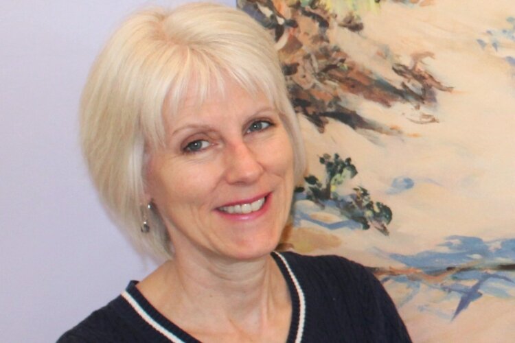 Kathleen Lesher is the owner of the Uptown Gallery & Frame Shop.