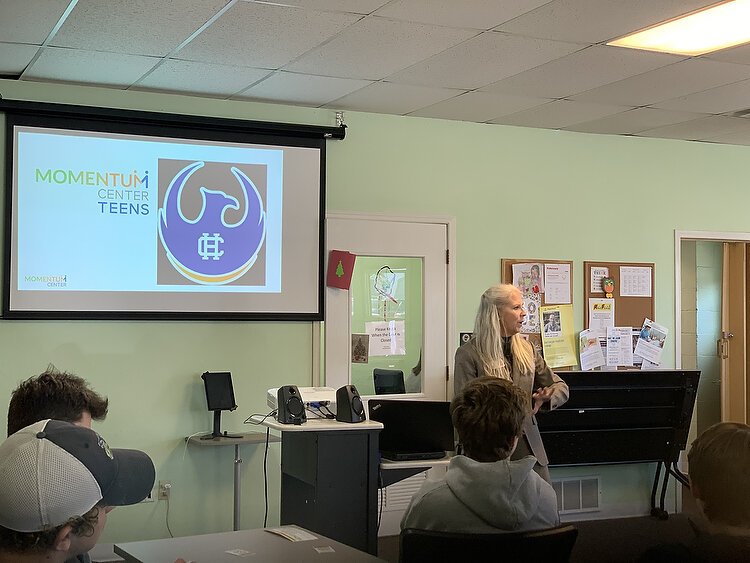 Barbara Lee VanHorssen gives a presentation to high school students.