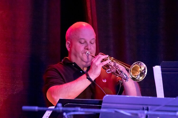 Keith Walker performs with the Holland Concert Jazz Orchestra. Photo by J&V Photography