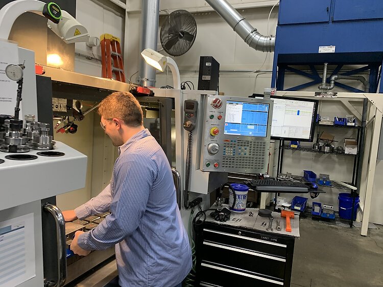 James Golden works on his machine at Fogg Filler.