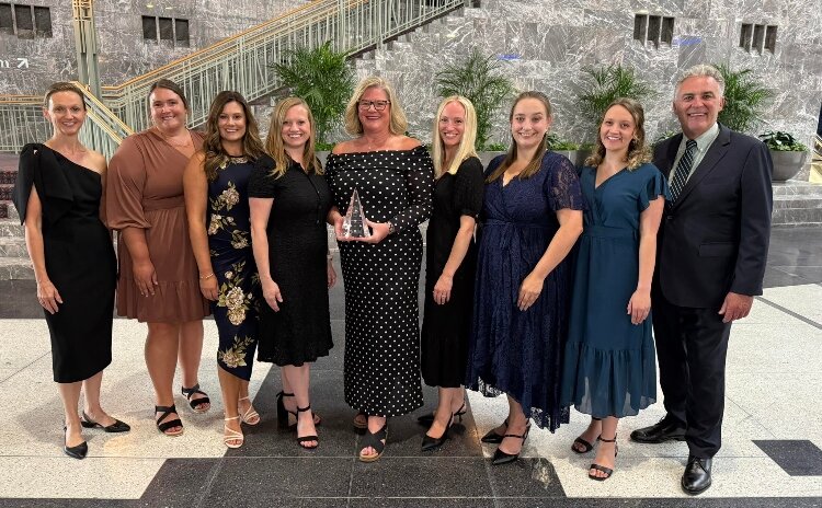 The Michigan West Coast Chamber team celebrates winning Chamber of the Year.