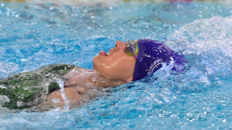 Grace Offman competed in the 100-yard freestyle, 50-yard backstroke, and 100-yard backstroke at The Hartford Nationals.