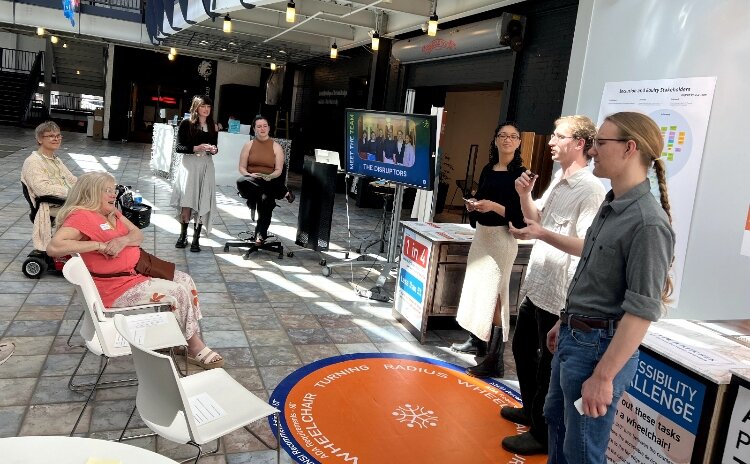 James Fischer and fellow KCAD students presenting their collaboration with DAKC.