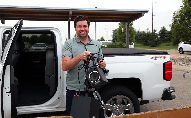A Gentex employee at the company's annual electronics recycling event.