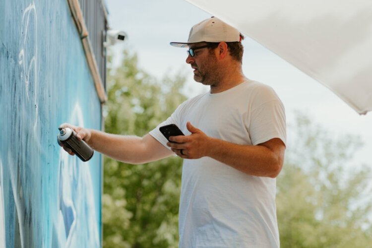 Muralists painted five new pieces of art during the 2023 Tulip City Walls Mural Festival.
