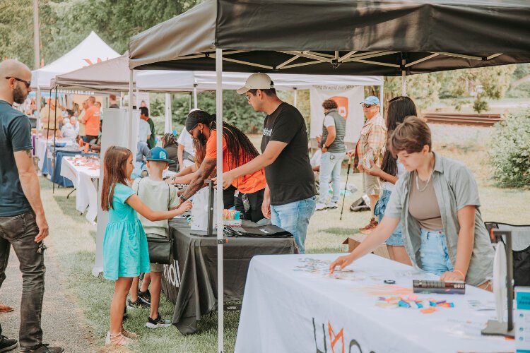 Dozens of community partners and vendors come together for Juneteenth Freedom Festival.