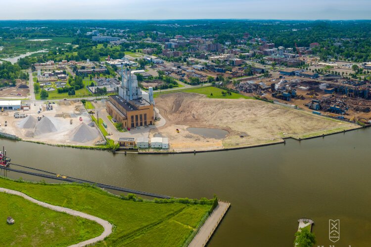 The city of Holland is in talks with Geenan DeKock Properties to sell parcels of waterfront land for redevelopment. However, several administrative steps lie between here and construction.