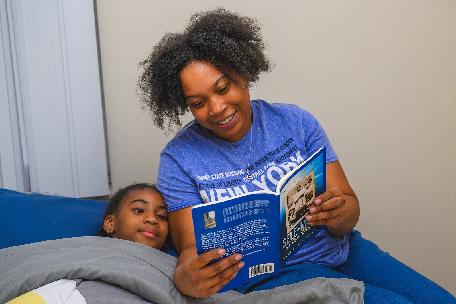 Shamirror Moncrief reads to her daughter at bedtime.
