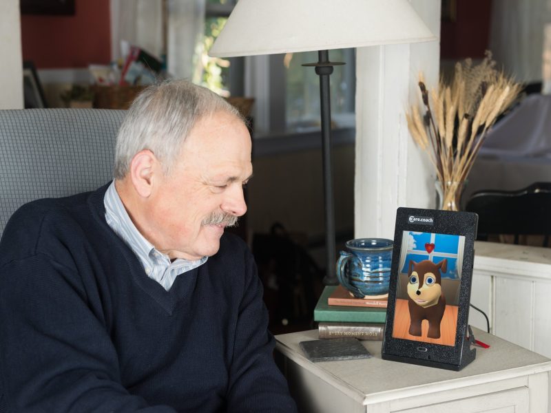 A man uses the care.coach tool, currently being deployed by Grand Rapids-based Care Resources PACE.